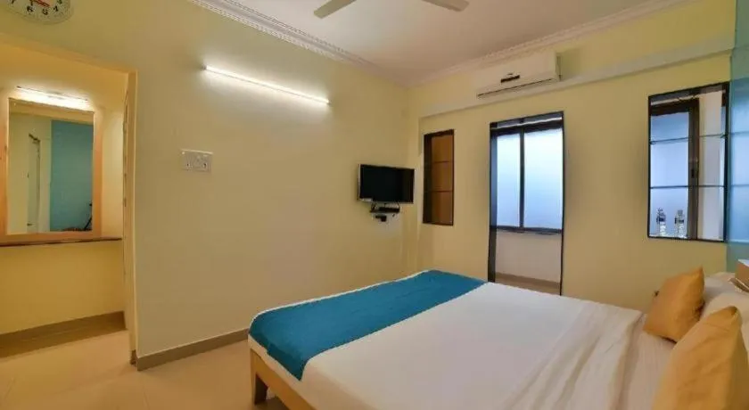 Bed in Palm Air by Goa Signature Stays