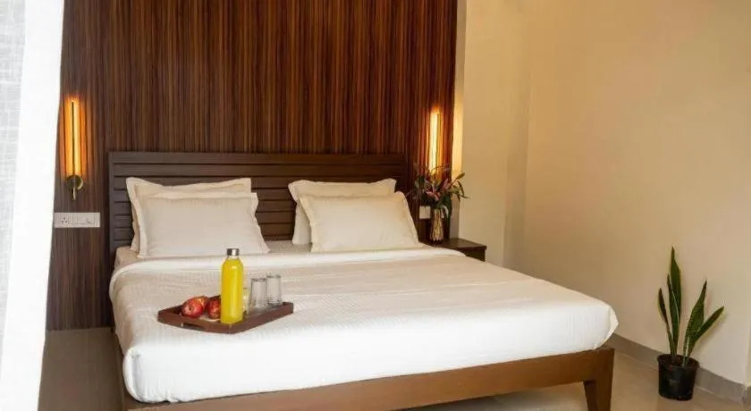Bed in Palm Air by Goa Signature Stays