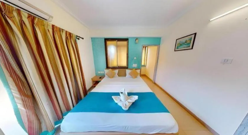 Bed in Palm Air by Goa Signature Stays