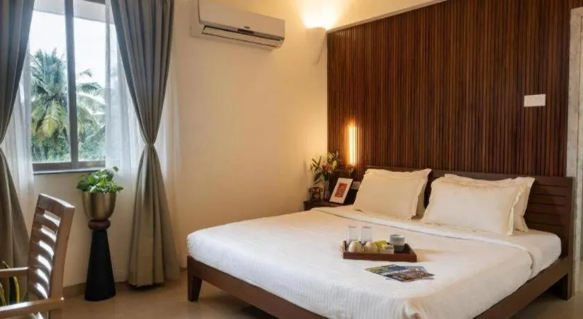Bed in Palm Air by Goa Signature Stays