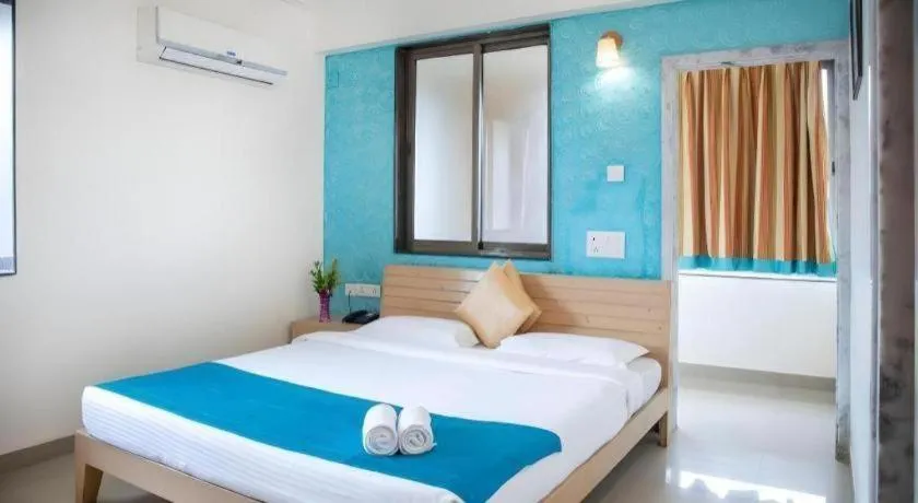 Bed in Palm Air by Goa Signature Stays