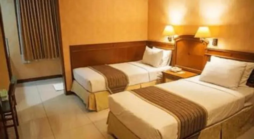 Bed in Diamond Hotel Solo