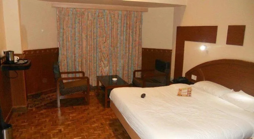 Bed in Hotel Hilltop Towers