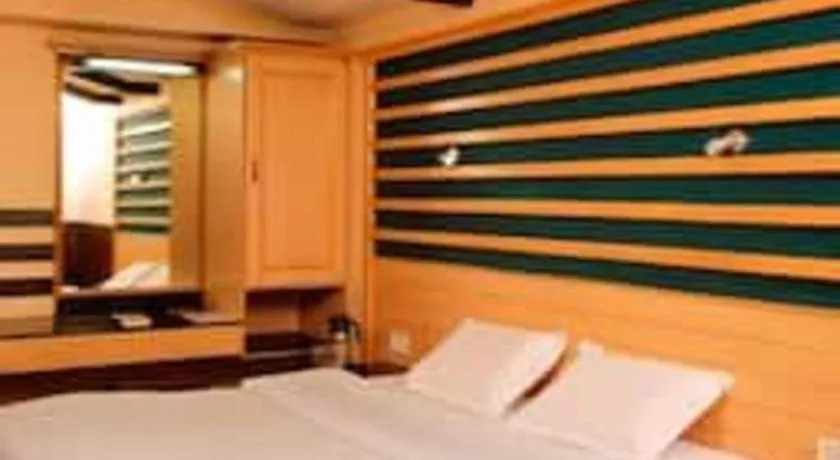 Bed in Hotel Hilltop Towers