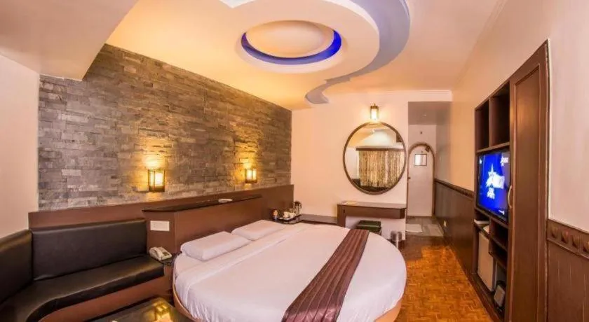 Bed in Hotel Hilltop Towers