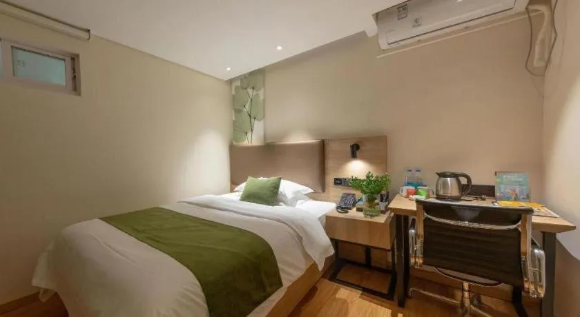 Bed in GreenTree Inn Changzhou Times Plaza Business Hotel