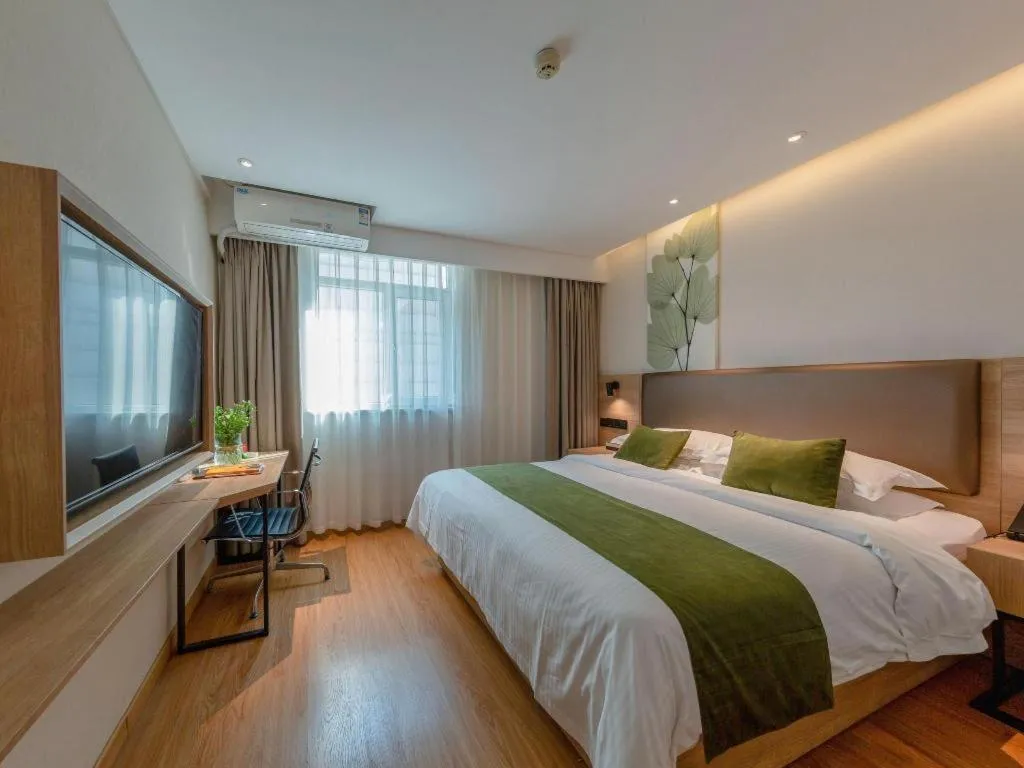 Bed in GreenTree Inn Changzhou Times Plaza Business Hotel
