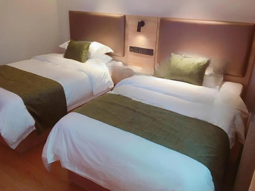 Bed in GreenTree Inn Changzhou Times Plaza Business Hotel