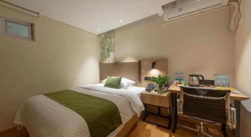 Bed in GreenTree Inn Changzhou Times Plaza Business Hotel