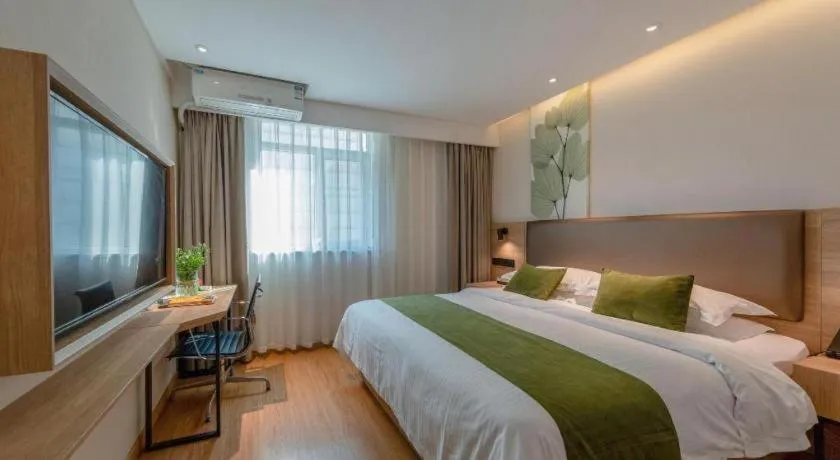 Bed in GreenTree Inn Changzhou Times Plaza Business Hotel