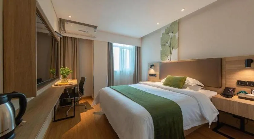 Bed in GreenTree Inn Changzhou Times Plaza Business Hotel