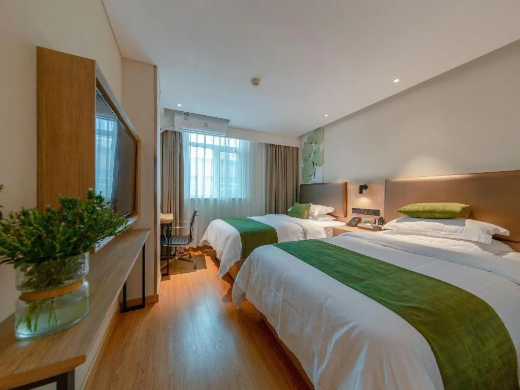 Bed in GreenTree Inn Changzhou Times Plaza Business Hotel