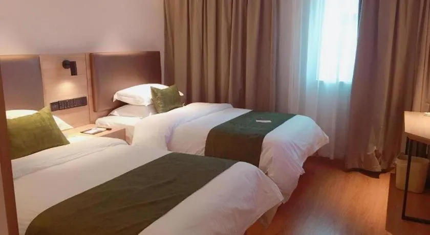 Bed in GreenTree Inn Changzhou Times Plaza Business Hotel
