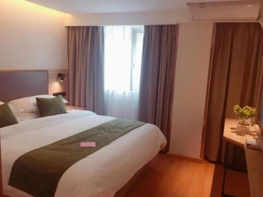 Bed in GreenTree Inn Changzhou Times Plaza Business Hotel