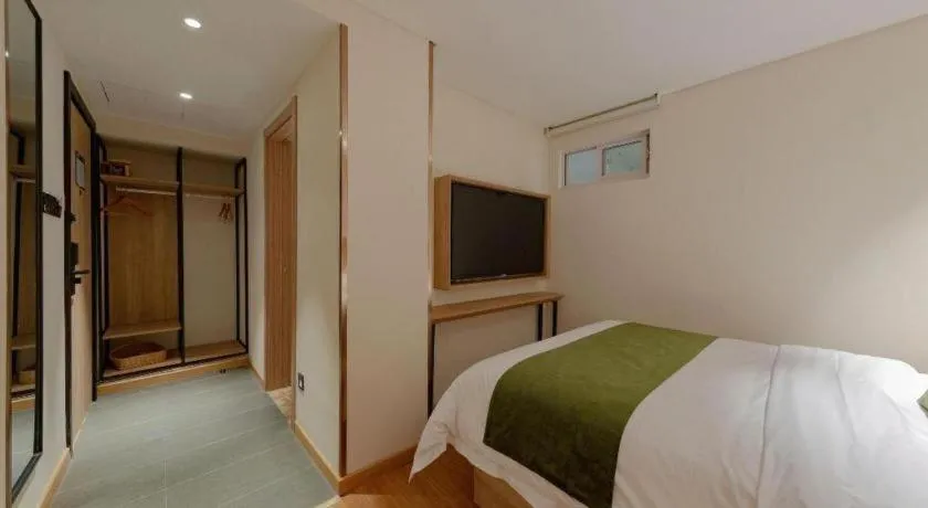 Bed in GreenTree Inn Changzhou Times Plaza Business Hotel