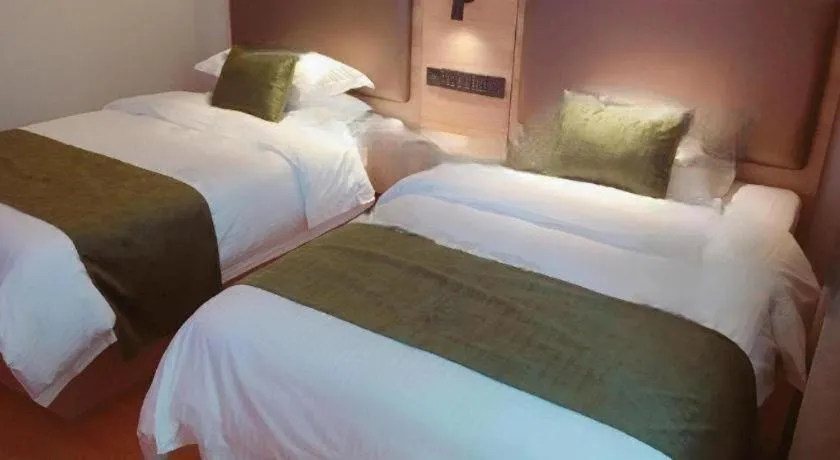 Bed in GreenTree Inn Changzhou Times Plaza Business Hotel