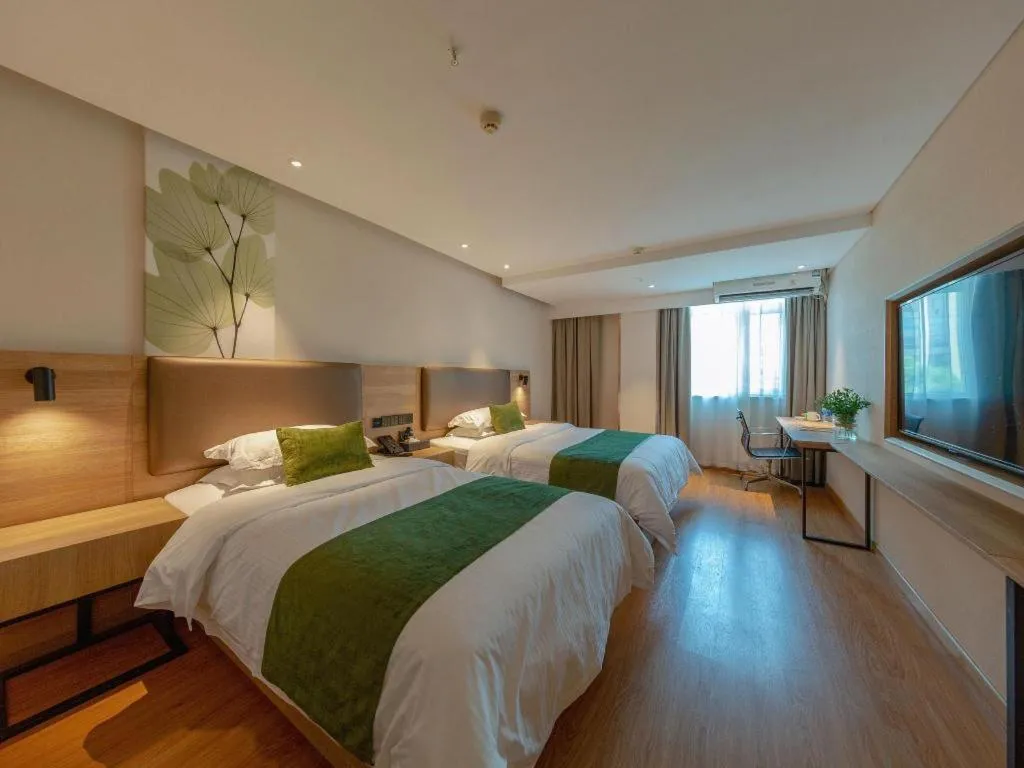 Bed in GreenTree Inn Changzhou Times Plaza Business Hotel