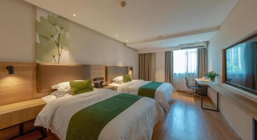 Bed in GreenTree Inn Changzhou Times Plaza Business Hotel