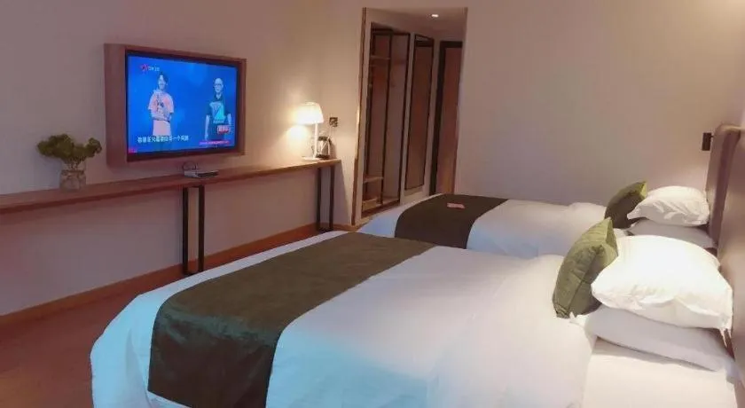 Bed in GreenTree Inn Changzhou Times Plaza Business Hotel