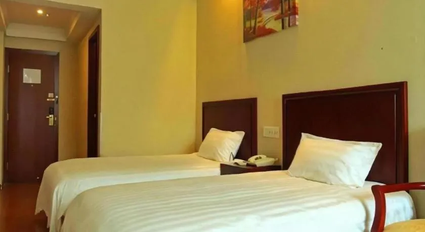 Bed in GreenTree Inn Changzhou Times Plaza Business Hotel