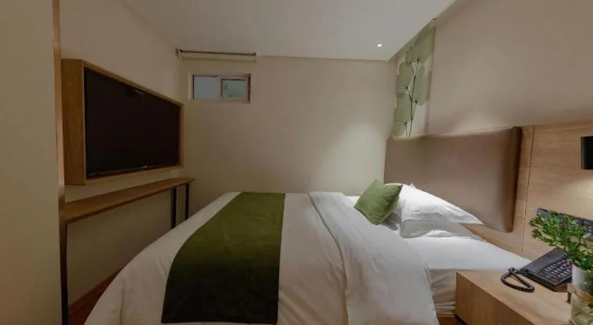 Bed in GreenTree Inn Changzhou Times Plaza Business Hotel
