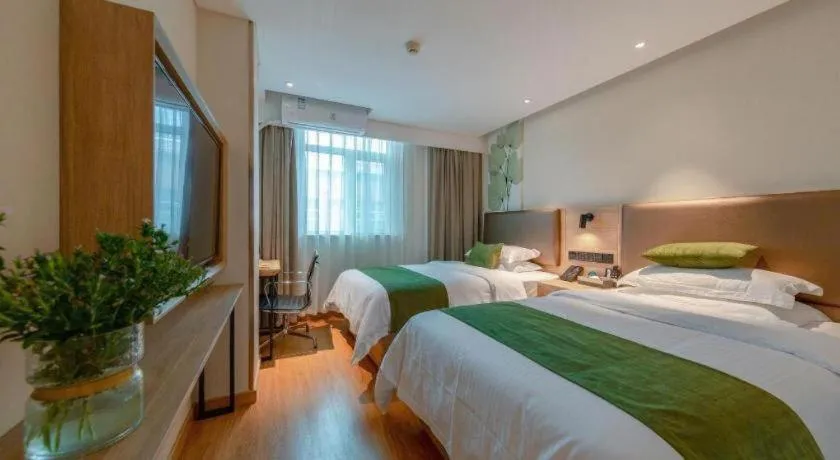 Bed in GreenTree Inn Changzhou Times Plaza Business Hotel