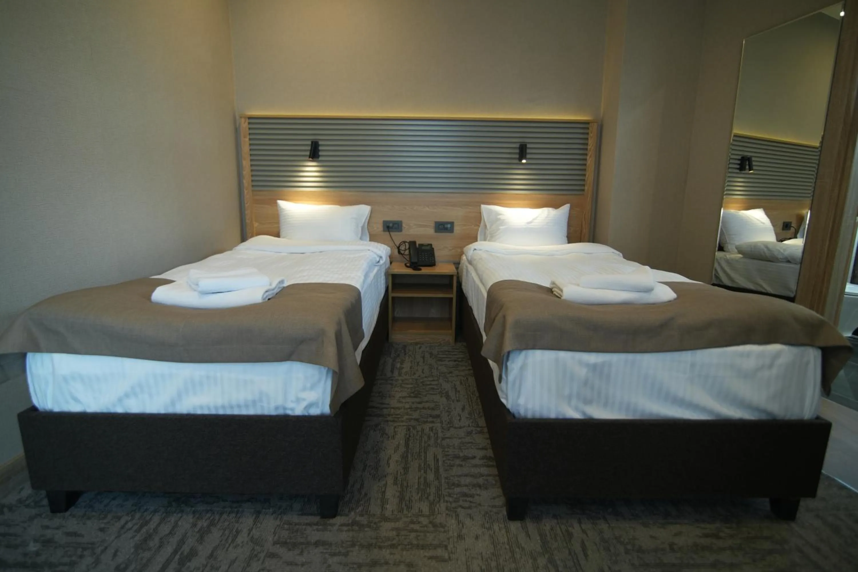 Bed in Kent Room Hotel