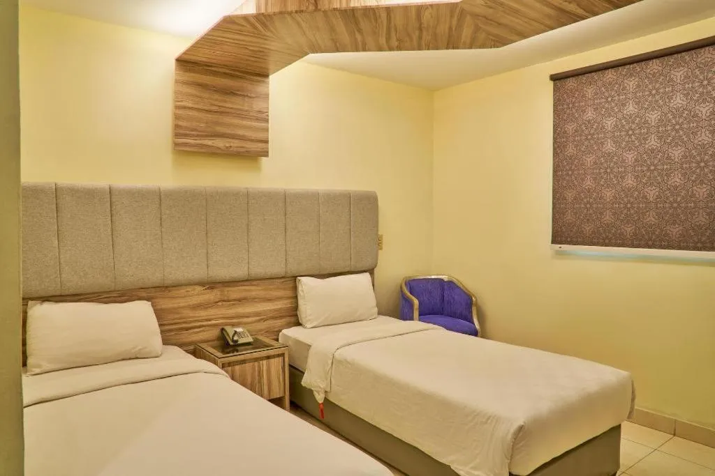 Bed in Hotel Alia Boutique Pasar Baru