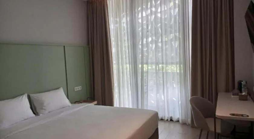 Bed in La Cama Boutique Hotel