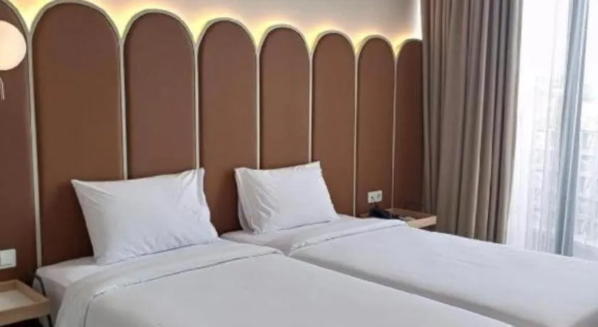 Bed in La Cama Boutique Hotel