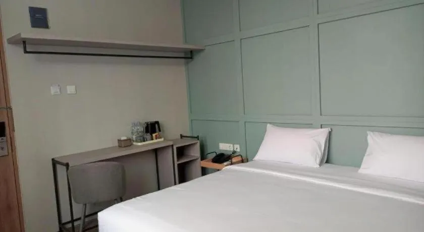 Bed in La Cama Boutique Hotel