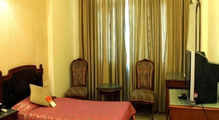 Bed in Hotel Grand President