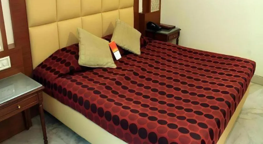 Bed in Hotel Grand President