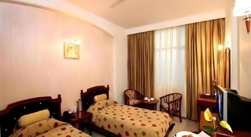 Bed in Hotel Grand President