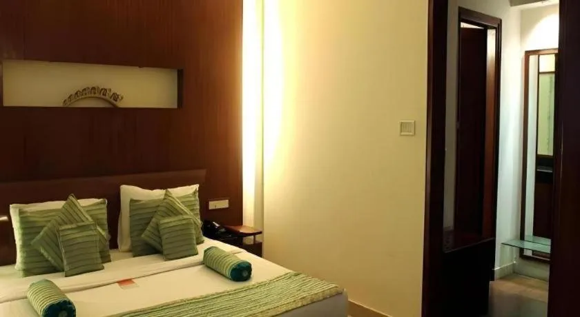 Bed in Hotel Grand President