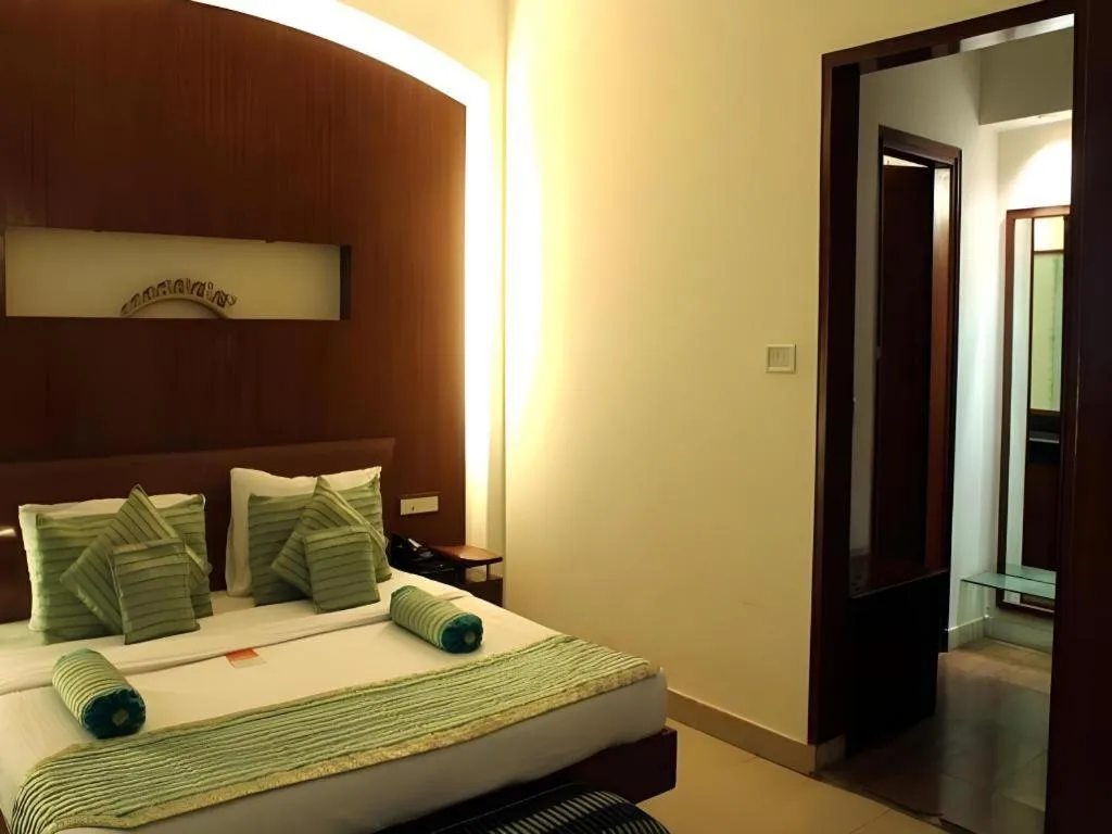 Bed in Hotel Grand President