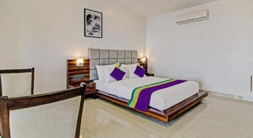 Bed in Nivanta Hotel Panchgani