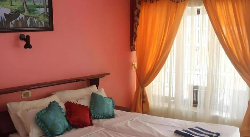 Bed in Jeevan Ayurvedic Beach Resort