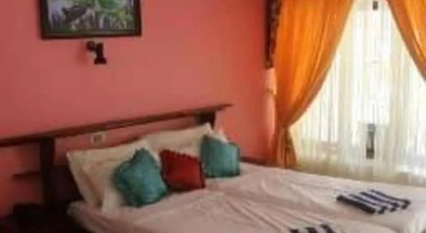 Bed in Jeevan Ayurvedic Beach Resort