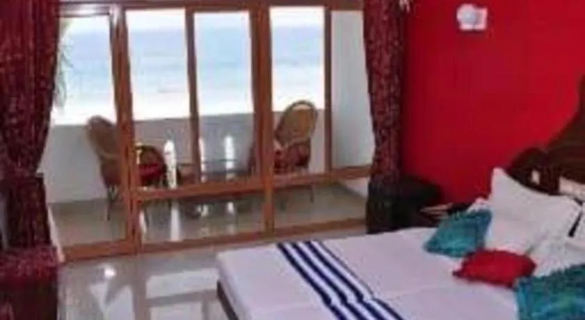 Bed in Jeevan Ayurvedic Beach Resort