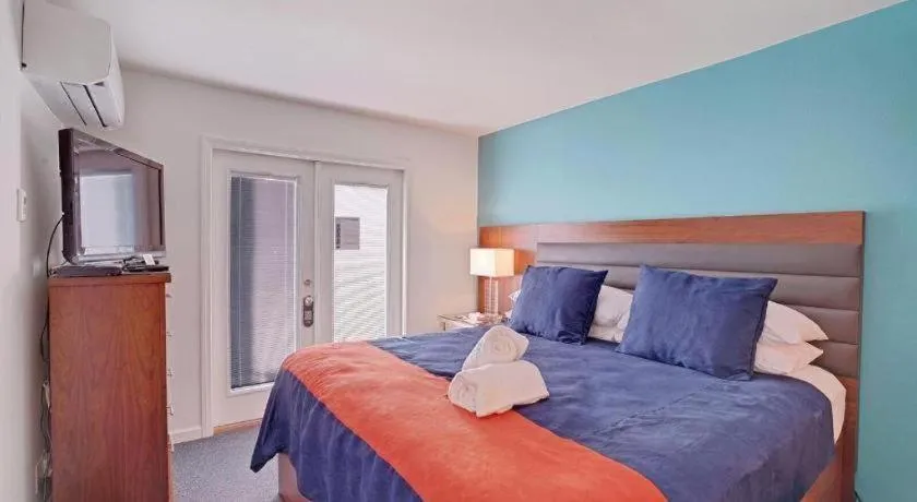 Bed in INNdulge Iconic Gay Men's Resort