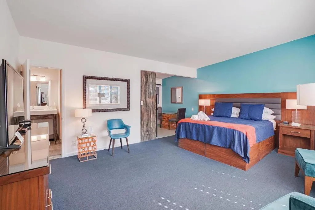 Bed in INNdulge Iconic Gay Men's Resort