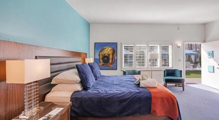 Bed in INNdulge Iconic Gay Men's Resort