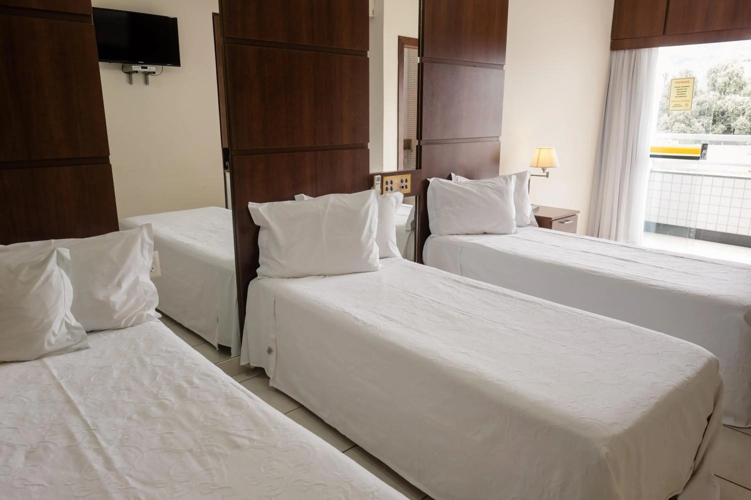 Bed in Ibituruna Center Hotel