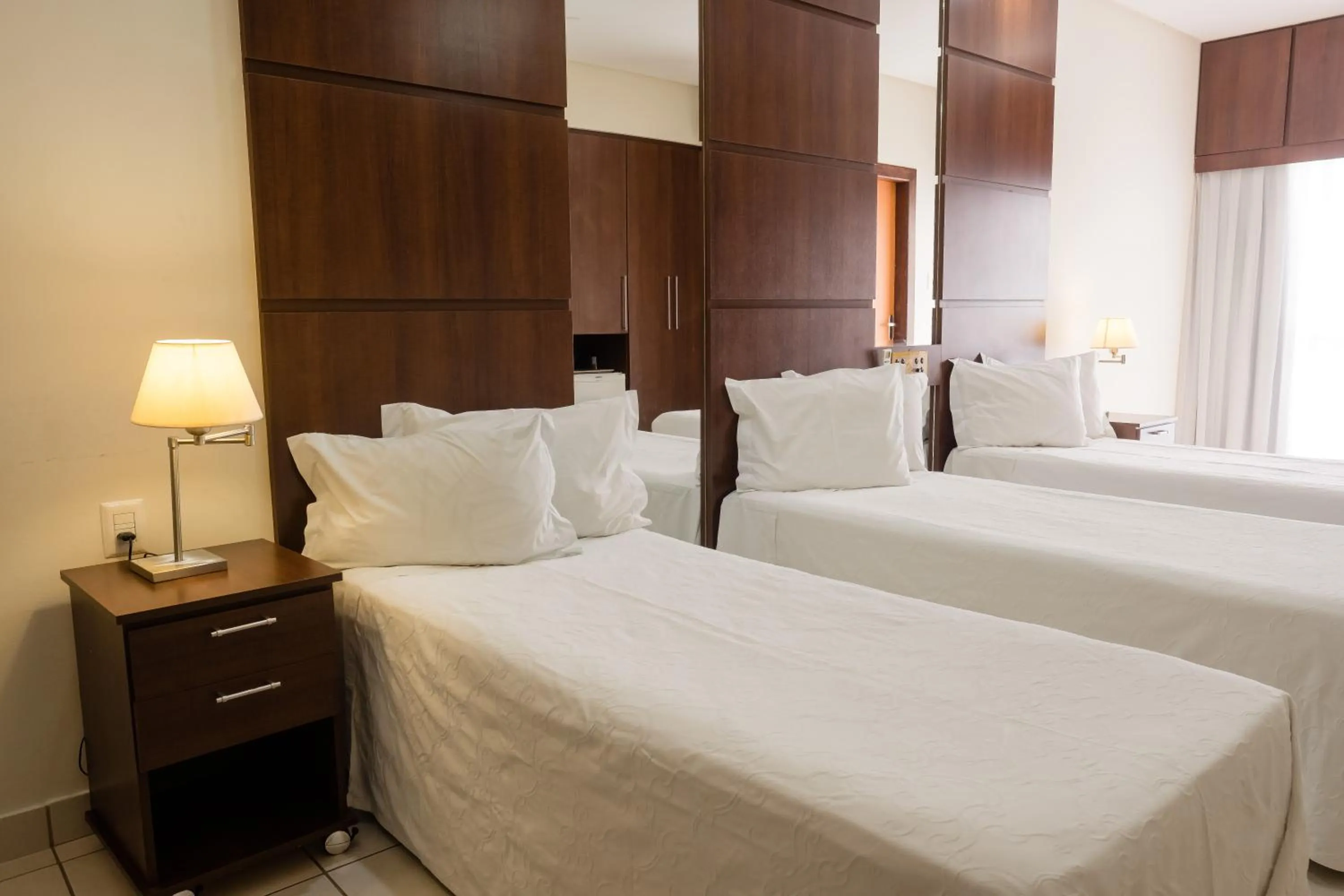 Bed in Ibituruna Center Hotel