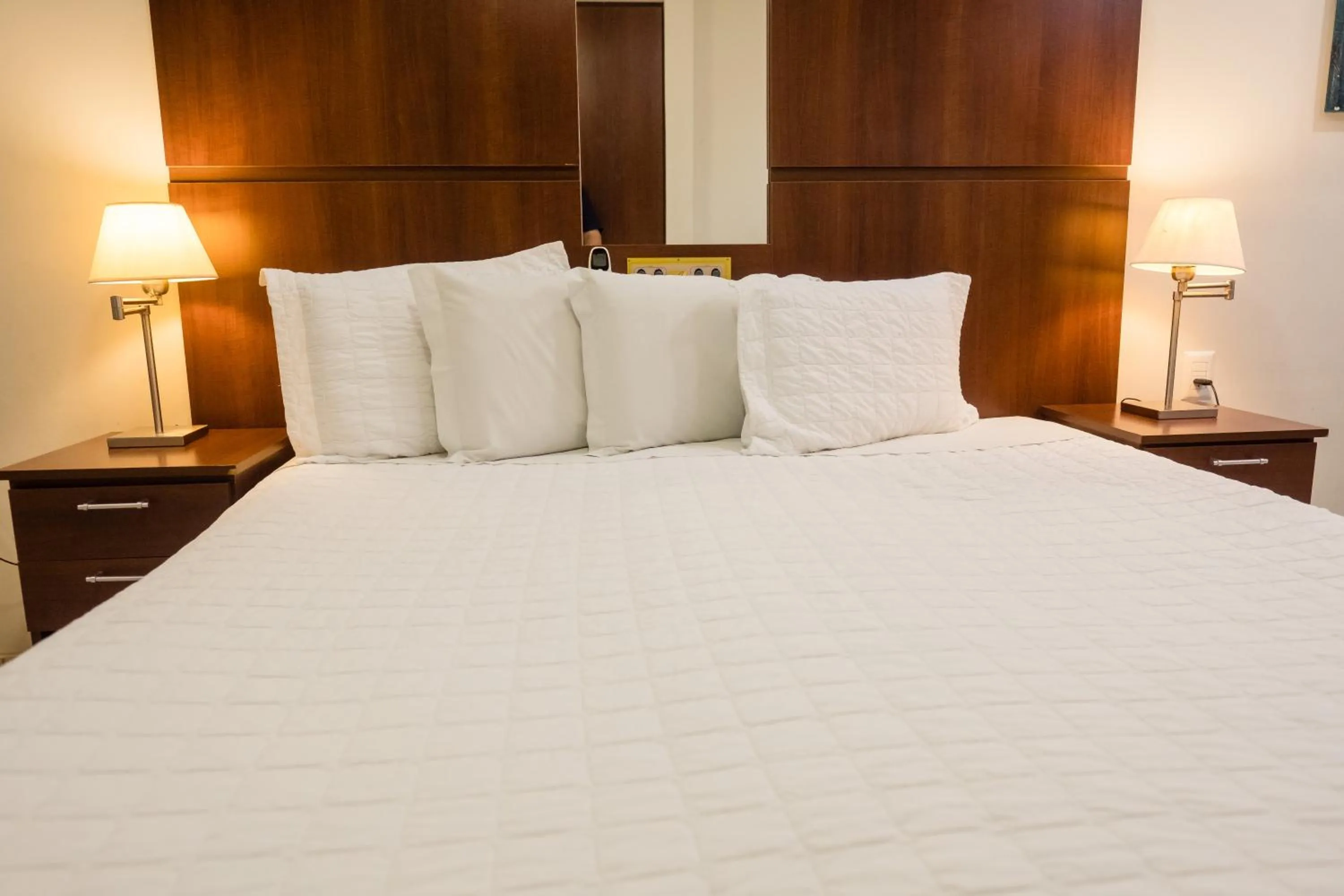 Bed in Ibituruna Center Hotel