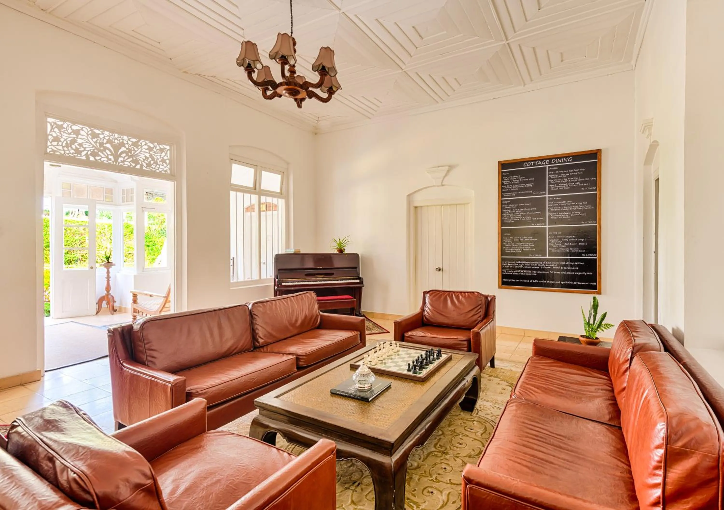 Communal lounge/ TV room in Xavier's Cottage