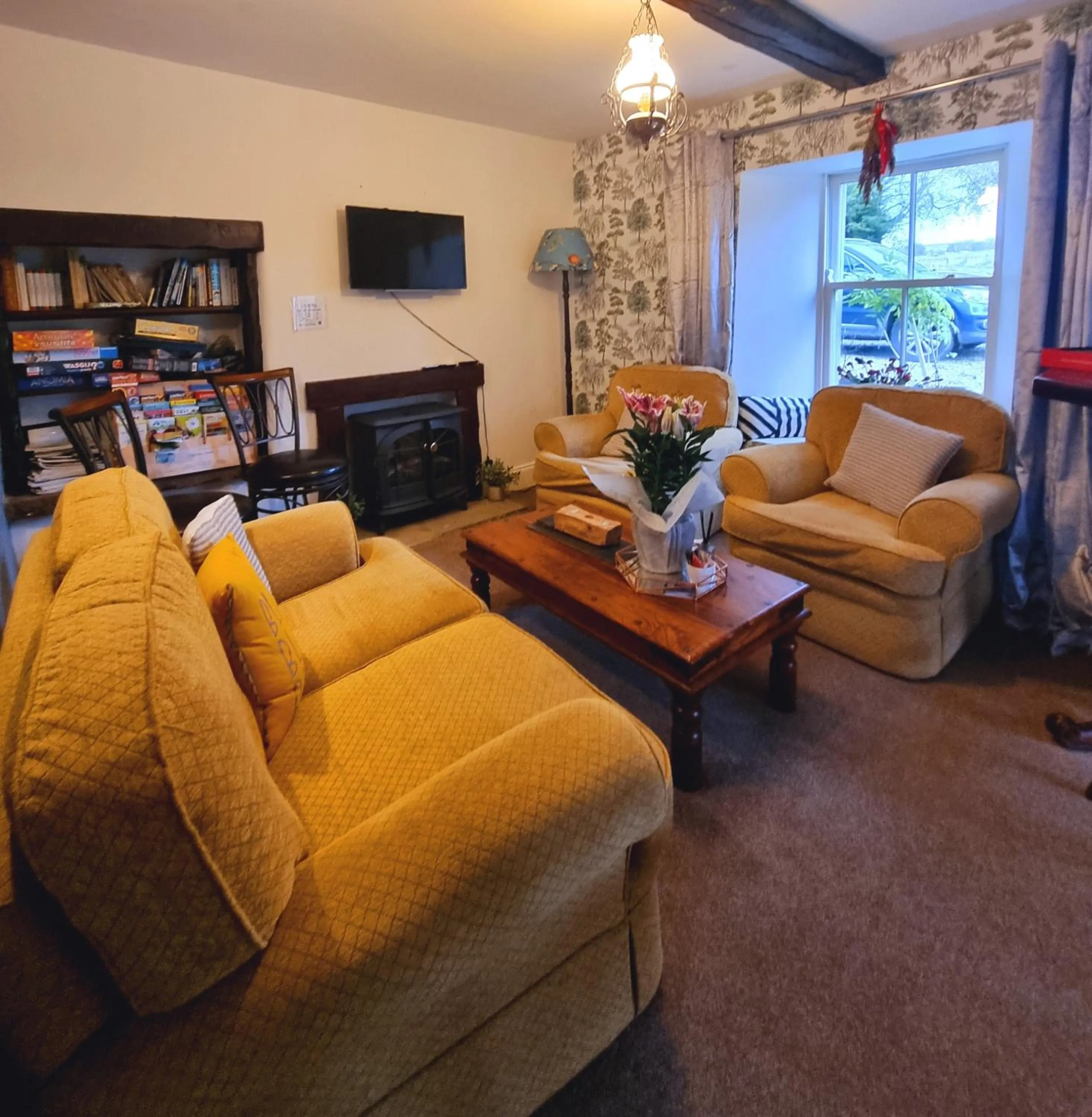 Communal lounge/ TV room in Lane Head Farm Country Guest House