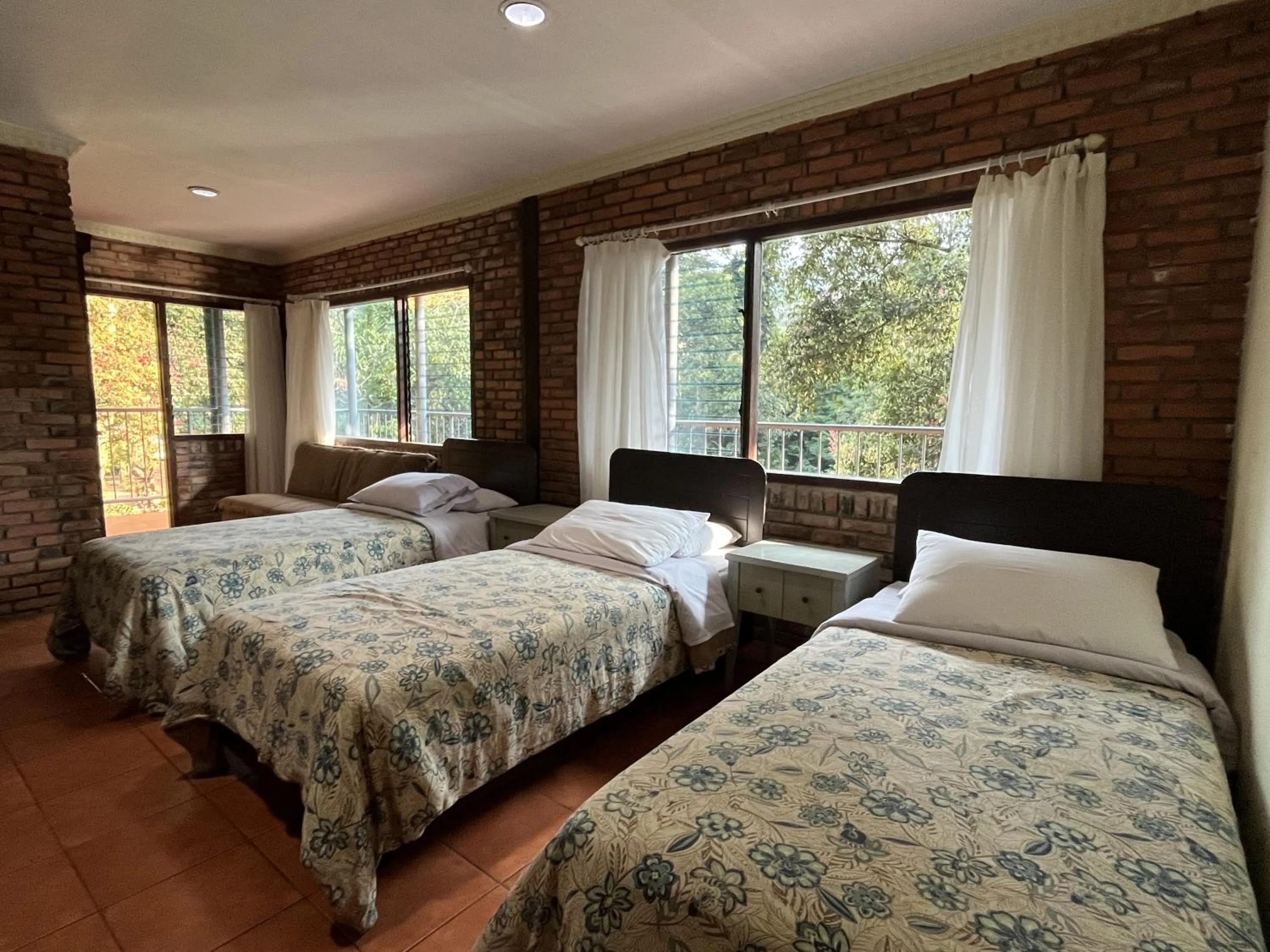 Bed in The Pinewood Lodge and Organic Farm