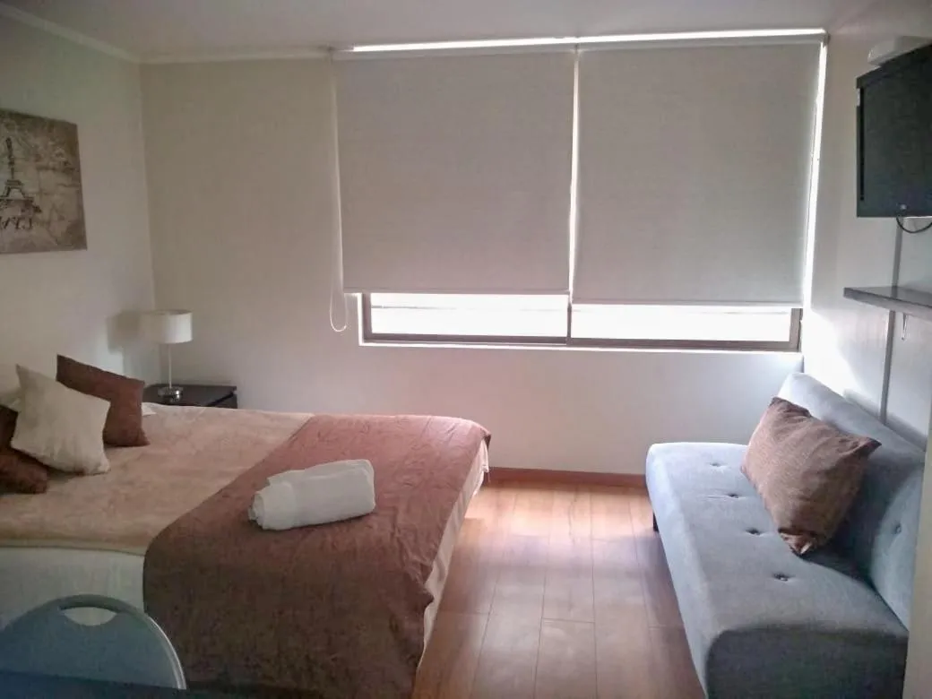 Photo of the whole room, Bed in Apartamentos Costanera Centre